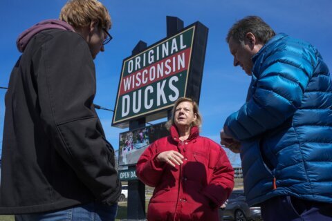 In swing-state Wisconsin, Democrat hustles to keep key Senate seat against Trump-backed millionaire