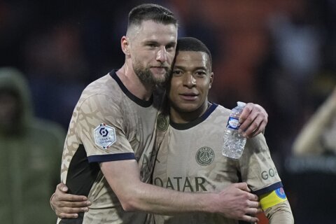 Mbappe nets twice in win over Lorient but PSG’s title party delayed by Monaco victory
