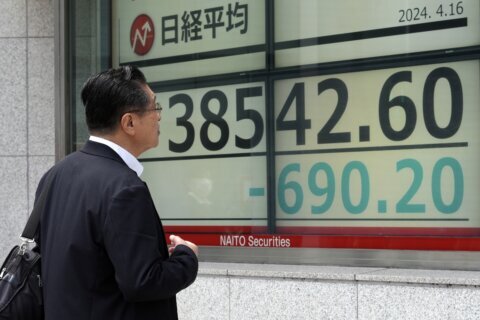Stock market today: Asian benchmarks trade mixed amid expectations for US rates to stay high