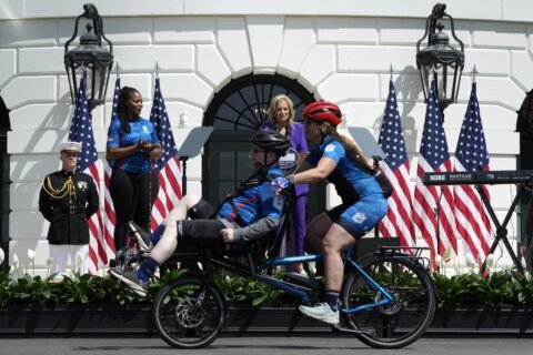 Jill Biden praises her husband’s advocacy for the military as wounded vets begin annual bike ride