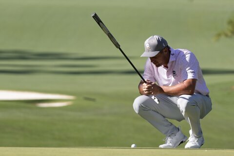 After a messy back nine, DeChambeau's final swing keeps him in the mix at the Masters