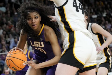 LSU star Angel Reese declares for WNBA draft via Vogue photo shoot, says 'I didn't want to be basic'