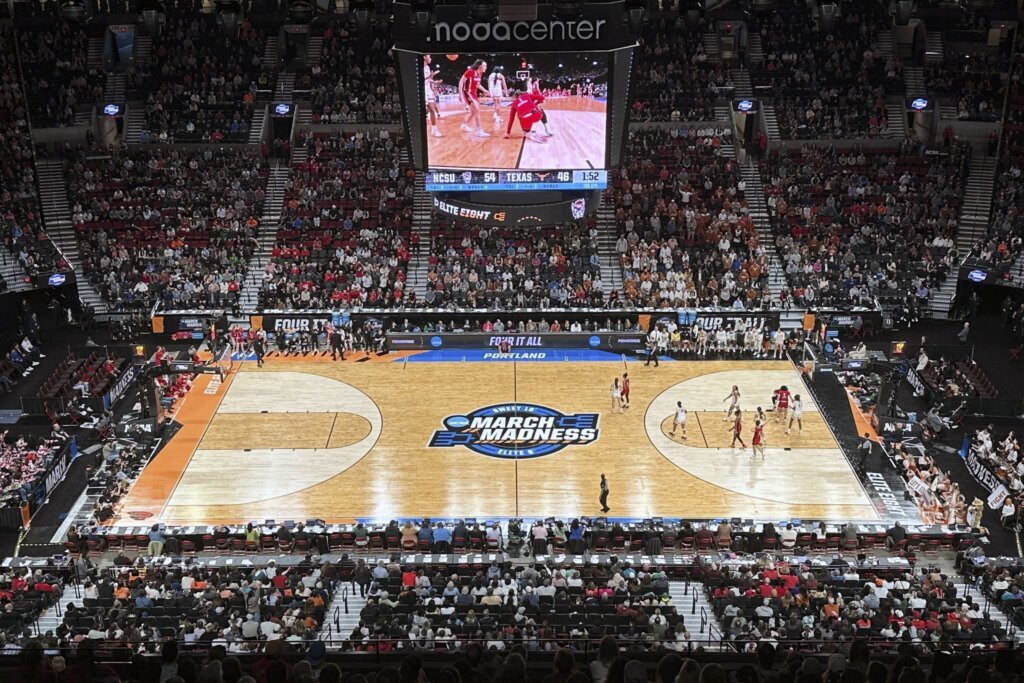 NCAA says a 3-point line was drawn 9 inches short at Portland women’s regional by court supplier