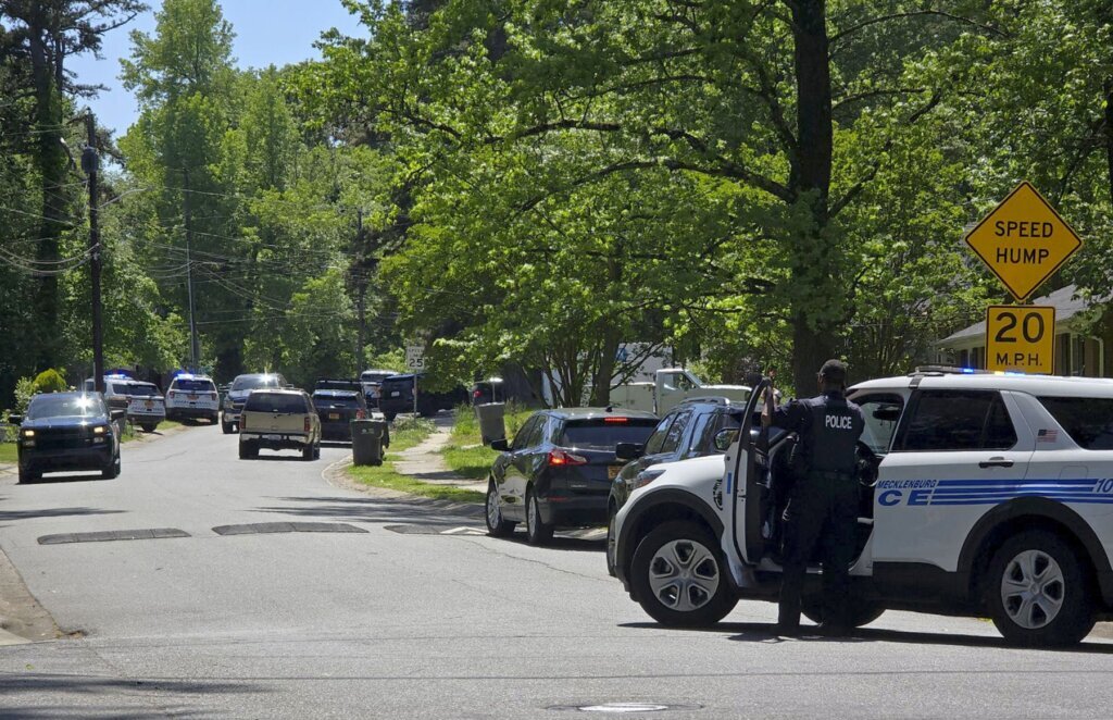 4 law officers serving warrant are killed, 4 wounded in shootout at North Carolina home, police say