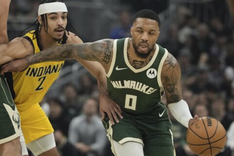 Damian Lillard’s 35-point 1st half helps Bucks beat Pacers 109-94 without Giannis in playoff opener