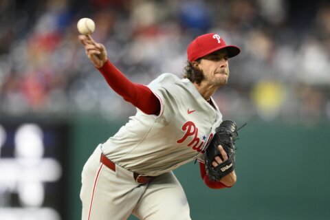 Nola earns 14th victory as NL East champion Phillies beat the Nationals 6-3 in regular-season finale