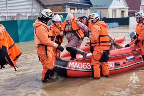 Thousands are evacuated after floods break a dam in the Russian city of Orsk