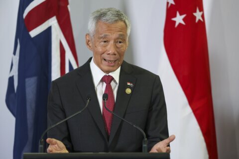 Singapore PM Lee to step down on May 15 and hand power to his deputy