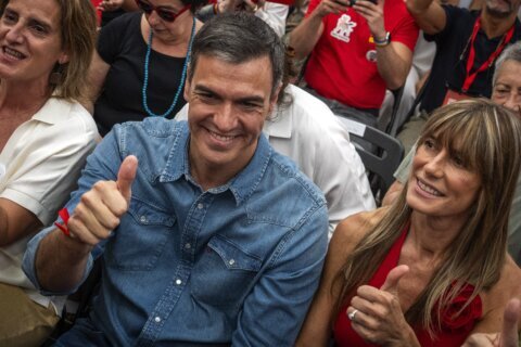 Spain’s Prime Minister Sánchez says he’ll continue in office after days of reflection.