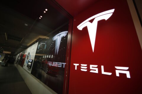 Tesla 1Q profit falls 55%, but stock jumps as company moves to speed production of cheaper vehicles