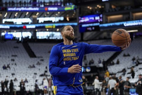 Stephen Curry tells the AP why 2024 is the right time to make his Olympic debut