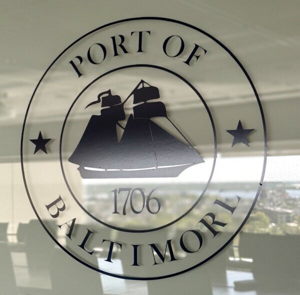 Logo of the Port of Baltimore seen on reflecting glass