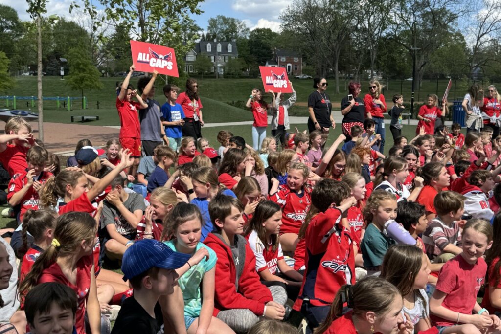 Arlington elementary schoolers cheer on the Washington Capitals during playoff pep rally