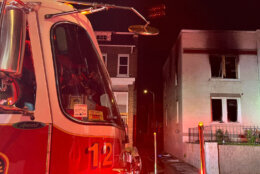 FIre engine on scene of apartment building fire