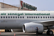 A boeing 737-700 af Air Senegal is pictured on the tarmac in front of a hangar housing the head offices of the company on April 27, 2009. Air Senegal ceased all operations amid an ownership dispute 4 days ago stemming from financial difficulties, between Dakar and the company's majority stakeholder Royal Air Maroc.  AFP PHOTO GEORGES GOBET (Photo by Georges GOBET / AFP) (Photo by GEORGES GOBET/AFP via Getty Images)