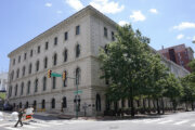 A pedestrian passes by the US 4th Circuit Court of Appeals Courthouse on Main Street in Richmond, Va., Wednesday, June 16, 2021. (AP Photo/Steve Helber)