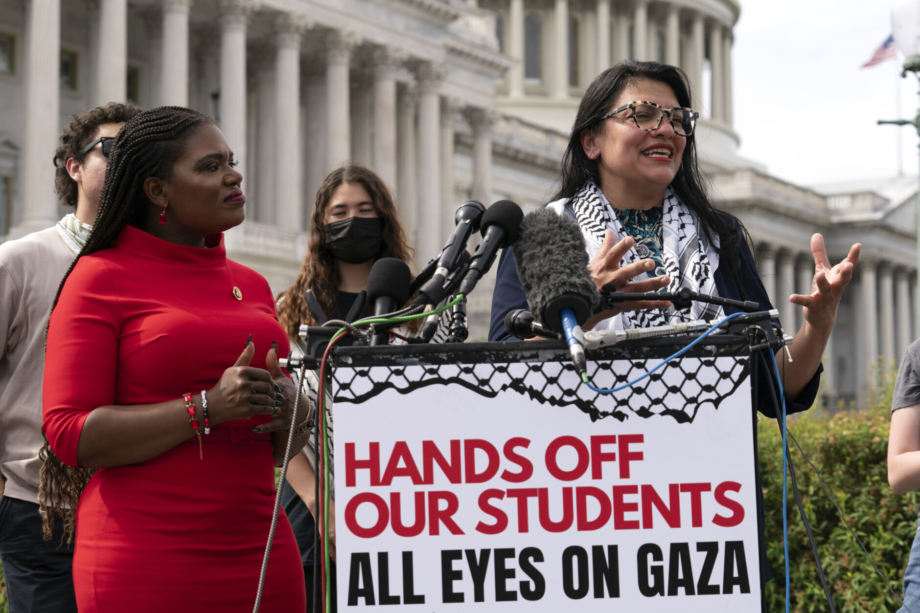 Rep. Cori Bush, D-Mo., and Rep. Rashida Tlaib, D-Mich., accompanied by George Washington University students speaks during a news conference at the U.S. Capitol, Wednesday, May 8, 2024, in Washington, after police cleared a pro-Palestinian tent encampment at George Washington University early Wednesday and arrested demonstrators. (AP Photo/Jose Luis Magana)