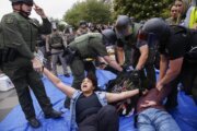 Police and pro-Palestinian demonstrators clash in tense scene at UCLA encampment