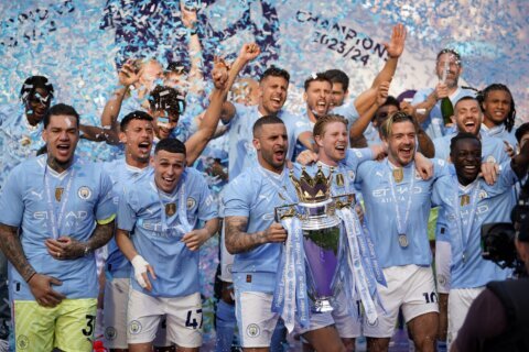 Man City fans party as Guardiola’s dominant team wins a record fourth straight Premier League title