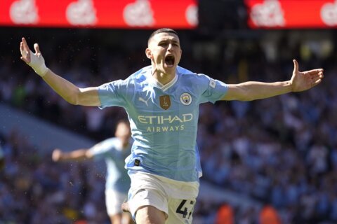 Phil Foden scores 2 early goals to put Man City on course for the Premier League title