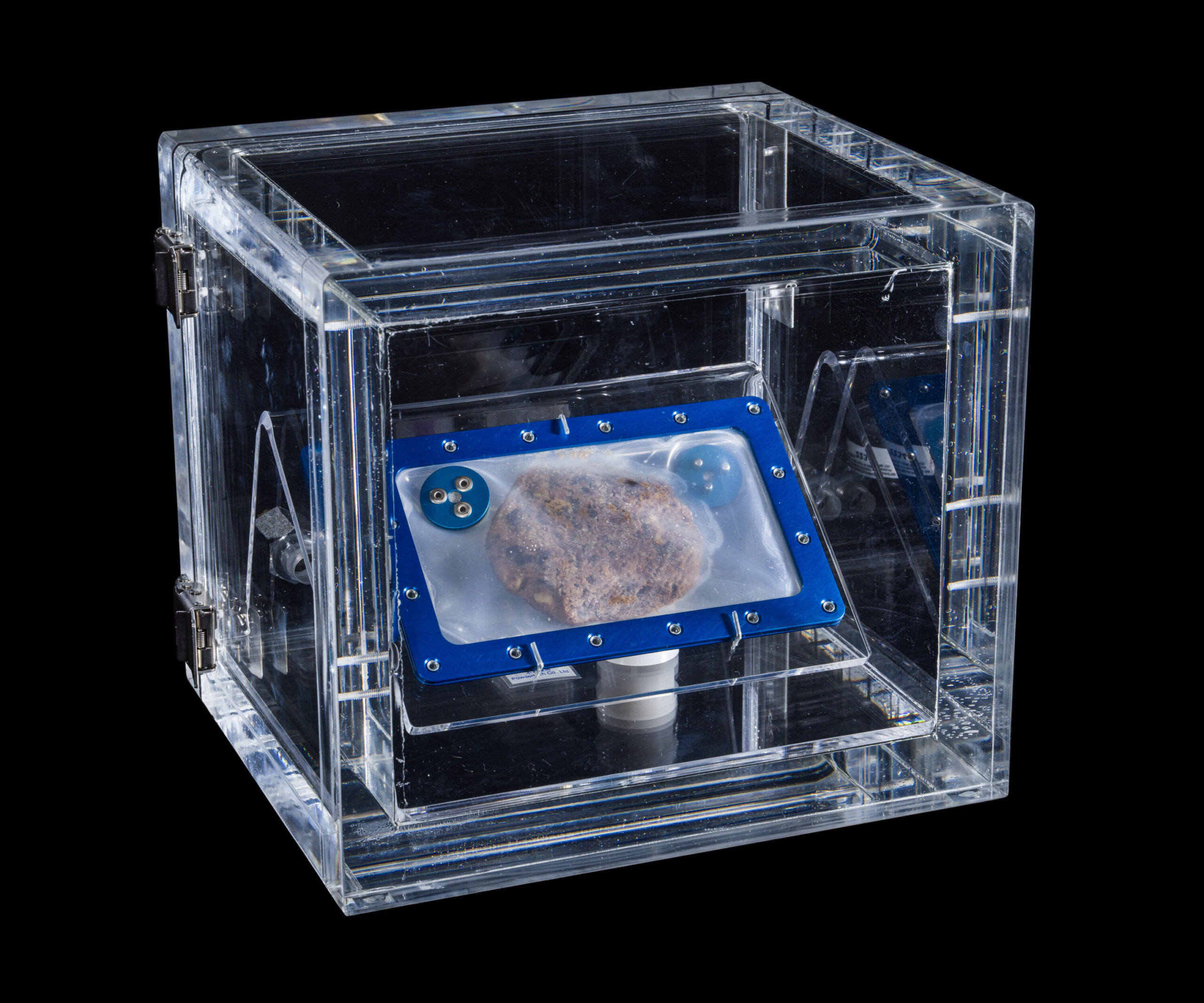 space cookie in an enclosed glass case