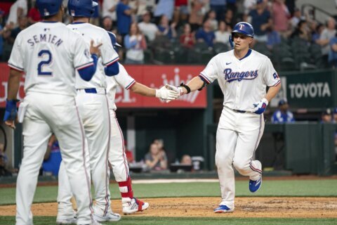 Seager hits 7th homer in 7 games as Rangers beat Diamondbacks 4-2 in World Series rematch