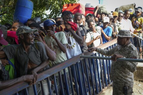 Dominicans vote in general elections with eyes on crisis in neighboring Haiti