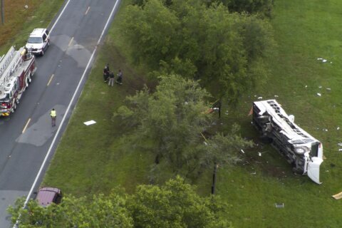 Pickup driver with lengthy record held in Florida bus crash that killed 8 Mexican farmworkers