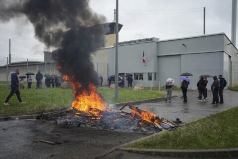 Massive manhunt in France for prison-break gang that gunned down officers