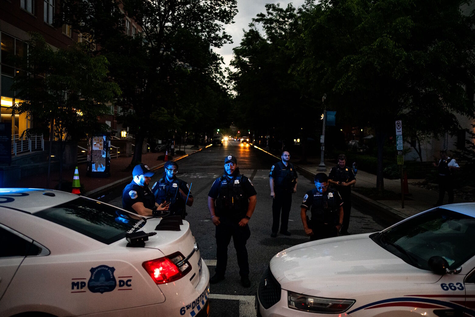 WASHINGTON, DC - MAY 8: Law Enforcement stand along H Street near where they cleared a Pro-Palestinian encampment at George Washington University's University Yard on May 8, 2024 in Washington, DC. Pro-Palestinian encampments have sprung up at college campuses around the country with some demonstrators calling for schools to divest from Israeli interests amid the ongoing war in Gaza. (Photo by Kent Nishimura/Getty Images)