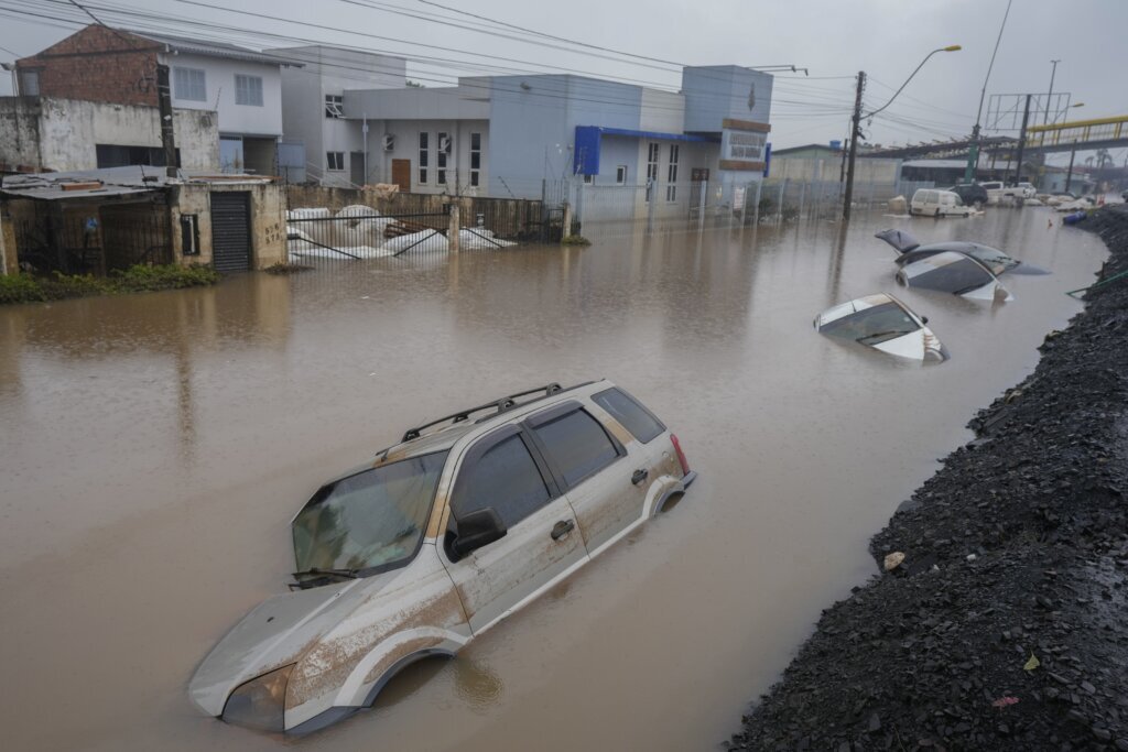 Brazil’s flooded south sees first deaths from disease, as experts warn of coming surge in fatalities
