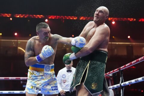 Usyk beats Fury by split decision to become the first undisputed heavyweight champion in 24 years