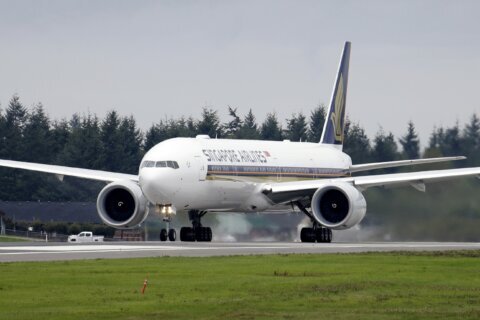 British man dies and several passengers are injured when turbulence hits a Singapore Airlines flight