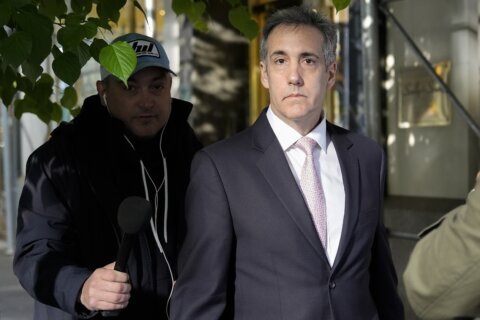 Cohen gives insider details at trial as Trump's defense attorney accuses him of seeking vengeance