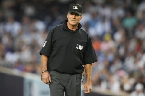 Scorned umpire Ángel Hernández, who unsuccessfully sued MLB for racial discrimination, retires