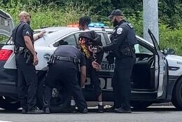police arresting suspect