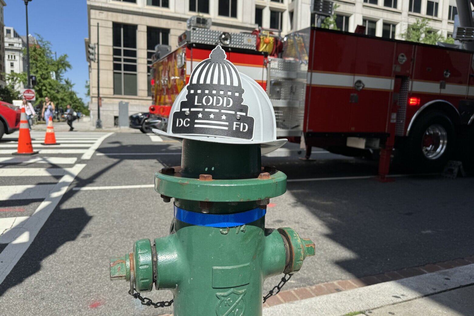 Firefighter helmets go up across DC to honor fallen heroes - WTOP News