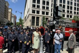 firefighters attending a memorial ceremony