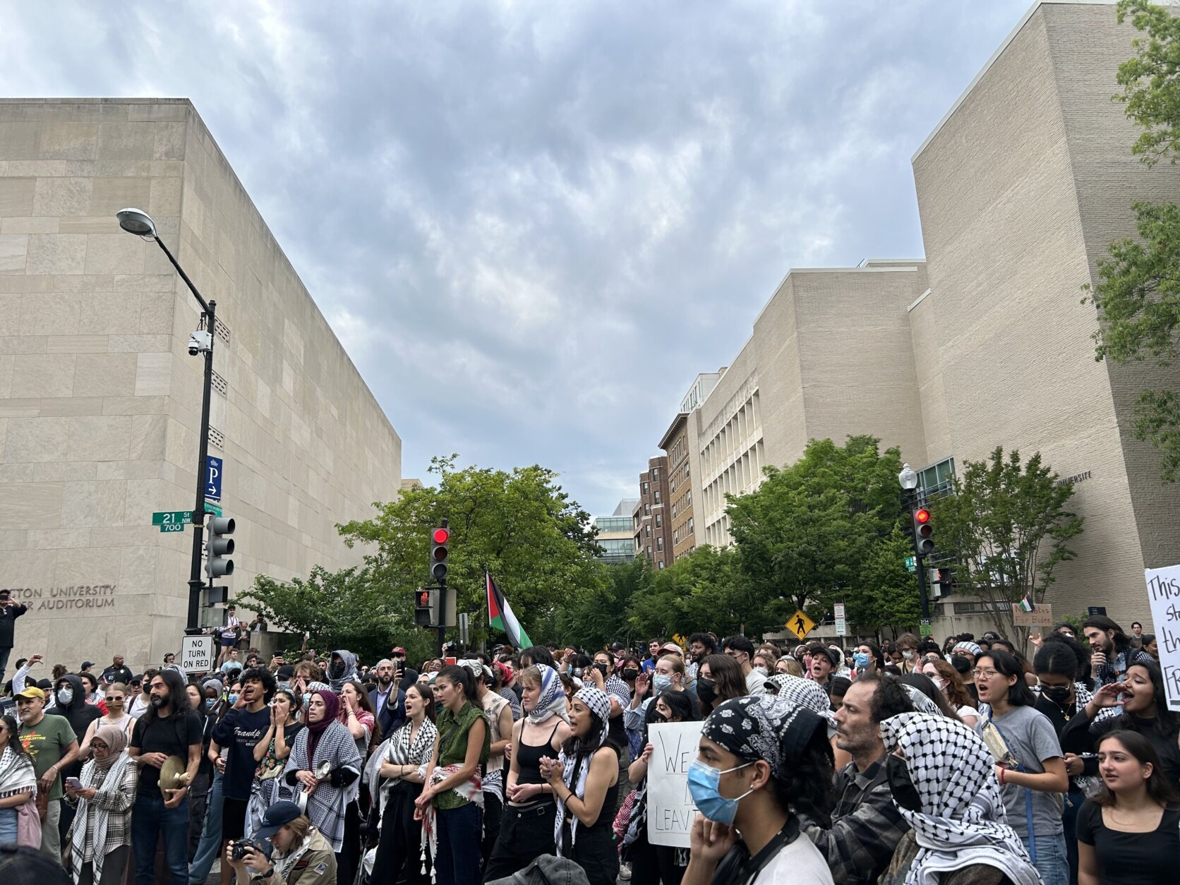 Pro-Palestinian protesters chant in the streets on George Washington University's campus