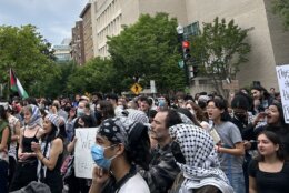 Pro-Palestinian protesters chant in the streets on George Washington University's campus