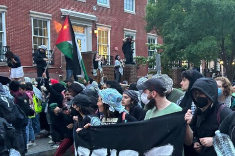 Pro-Palestinian protesters pitch tents on GW campus Thursday after encampment clearing