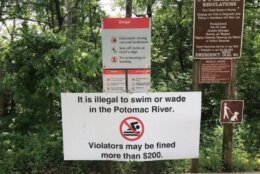 Sign in park saying swimming is illegal in Potomac River and violators could be fined more than $200