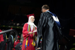 graduate getting diploma