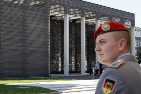 Germany sets aside unease over its military to celebrate first Veterans’ Day