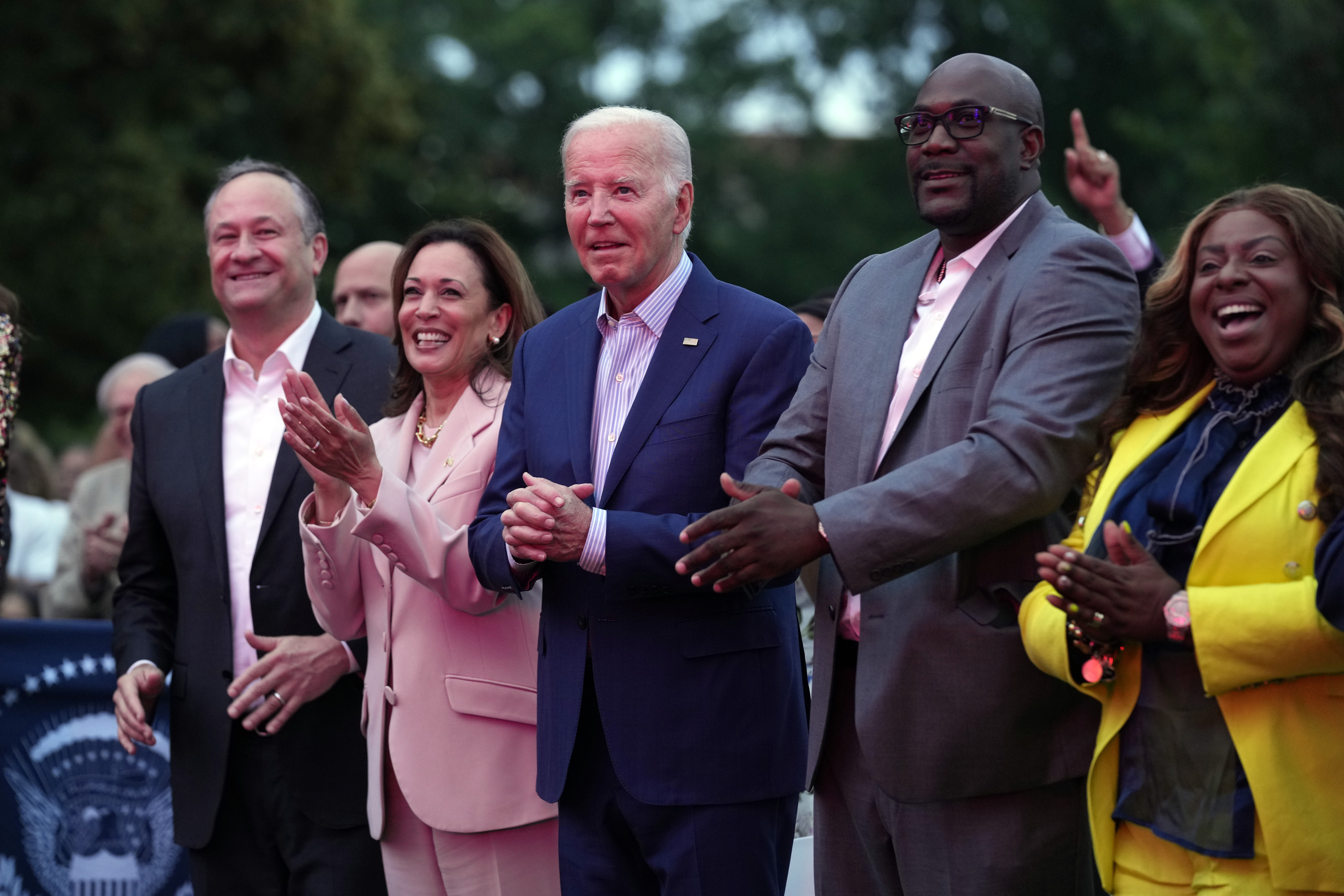 From left,, second gentleman Doug Emhoff Vice President Kamala Harris, President Joe Biden, Philonise Floyd, George Floyd's brother, and his wife Keeta Floyd, applaud during a Juneteenth concert on the South Lawn of the White House in Washington, Monday, June 10, 2024. (AP Photo/Susan Walsh)