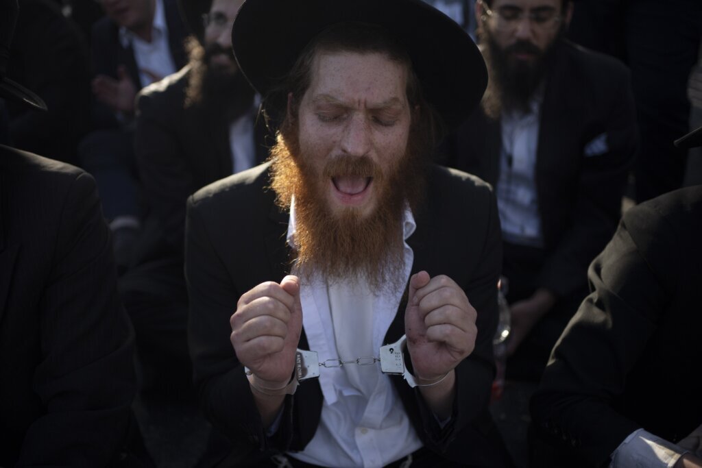 The Latest | Israeli Supreme Court rules that the military must begin drafting ultra-Orthodox men