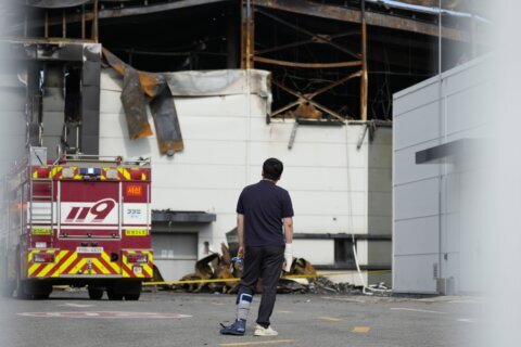 South Korean investigators search in factory ruins after fire killed 23, mostly Chinese migrants