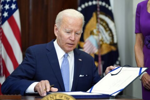 More than 500 people have been charged with federal crimes under the gun safety law Biden signed