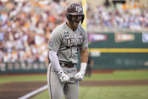 Texas A&M builds big lead early and beats Tennessee 9-5 in Game 1 of College World Series finals