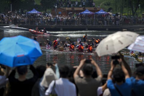 Taiwan nighttime dragon boat racing puts a modern twist on an ancient tradition